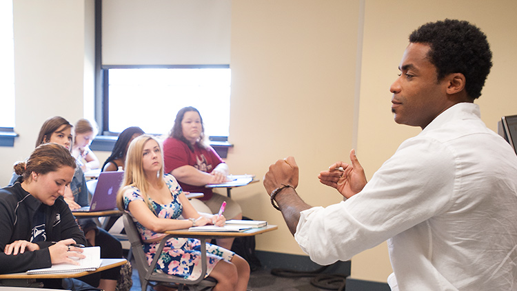 A professor talks to a class in Pan African Studies