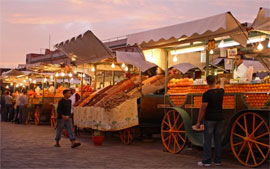 Evening scene at outdoor fruit and vegetable stands Evening scene at outdoor fruit and vegetable stands
