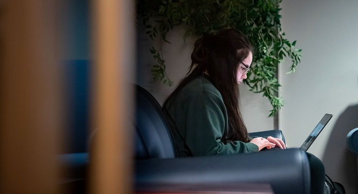 Student working on her laptop 