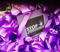 Stop Domestic Abuse - purple ribbons