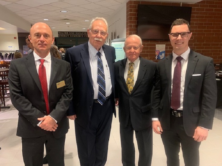 At the dedication of the Mackey Family Charitable Trust Financial Trading Room