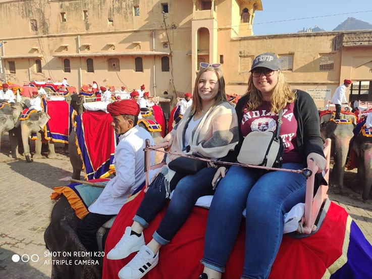 Ryley Deems, Alorah Colwell enjoy a ride on the royal elephants.