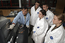 ROTC cadets work in lab with biology professor