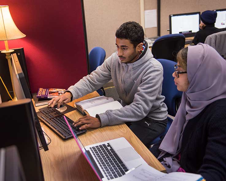 Two students working at the Writing Center 737px