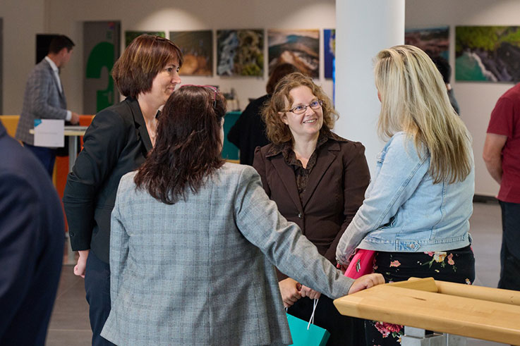 A group of women conversing