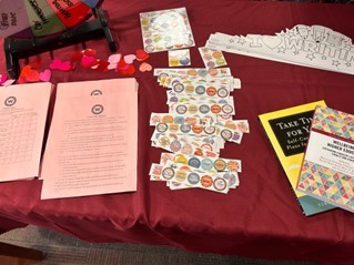table with various handouts